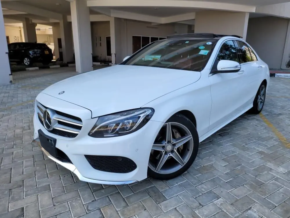 White Mercedes-Benz C-Class photographed from the front
