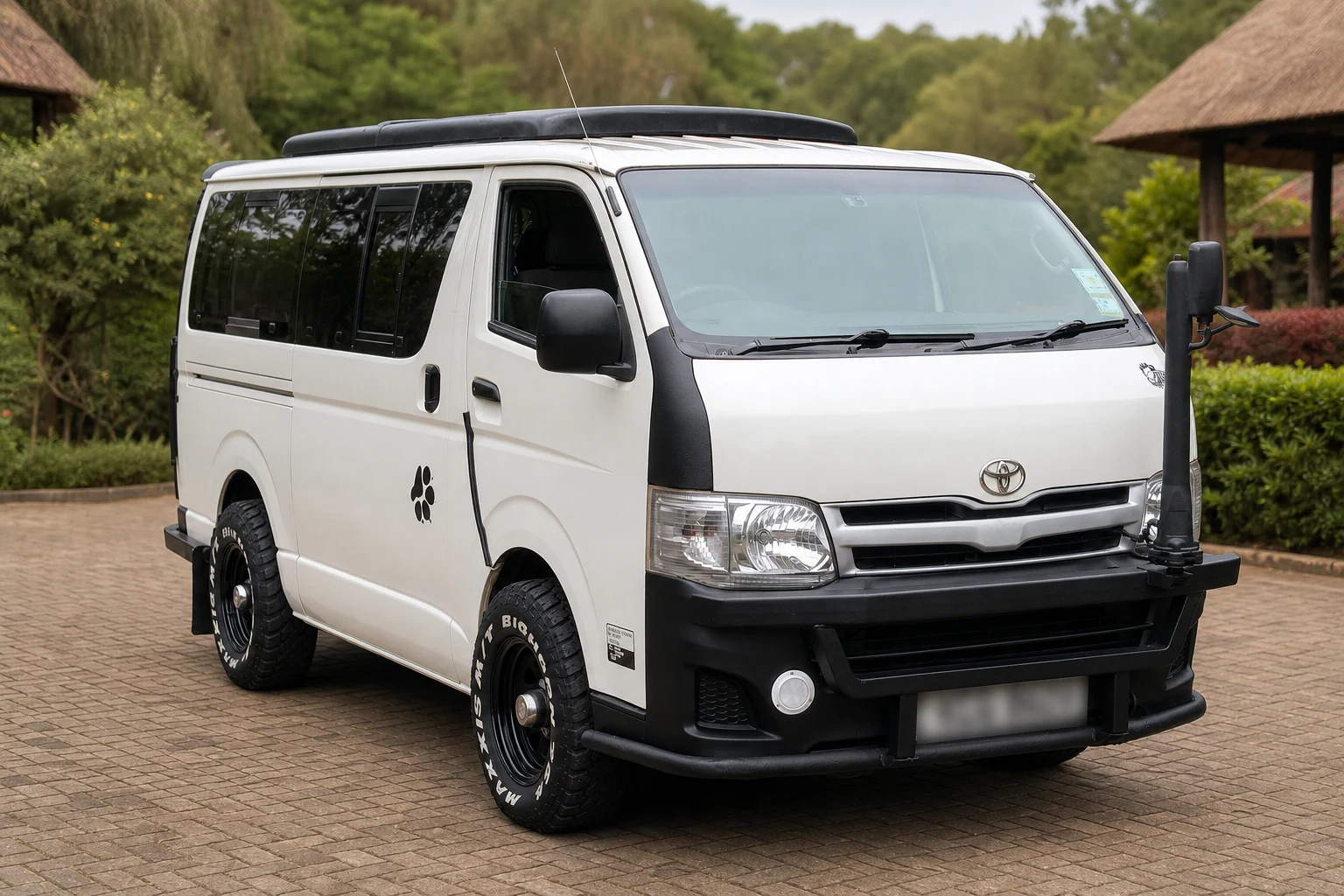 White Toyota Hiace safari van with raised viewing roof and snorkel